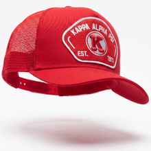 Load image into Gallery viewer, Red cap with a white logo on a white background