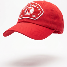Load image into Gallery viewer, Red cap with a logo and text on a white background