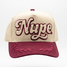 Load image into Gallery viewer, Beige and maroon cap with 'Nupe' logo on a white background
