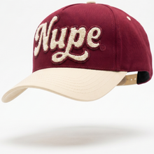 Load image into Gallery viewer, Maroon and beige cap with 'Nupe' text on a white background
