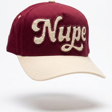 Load image into Gallery viewer, Maroon and beige cap with 'Nupe' text on a white background
