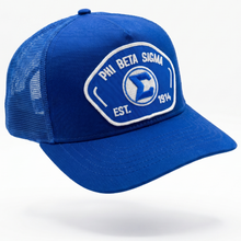 Load image into Gallery viewer, Blue cap with white logo and text on a white background
