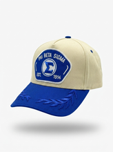 Load image into Gallery viewer, Beige and blue cap with Phi Beta Sigma logo on a white background
